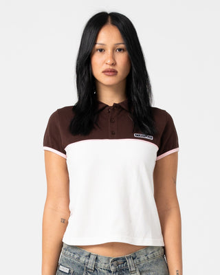 Woman wearing Insert Dad Joke Baby Polo Tee in Cream / Choc