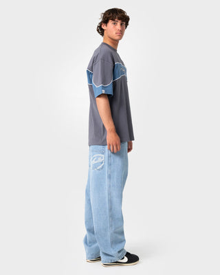 Man wearing Kinetic Short Sleeve Heavy Tee in Steel