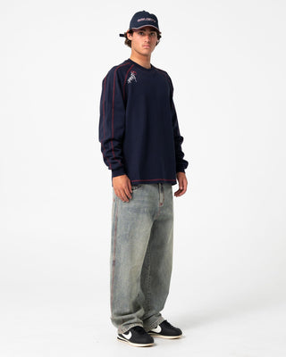 Man wearing Kurupt Long Sleeve Heavy Tee in Navy Blue