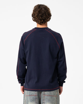 Man wearing Kurupt Long Sleeve Heavy Tee in Navy Blue