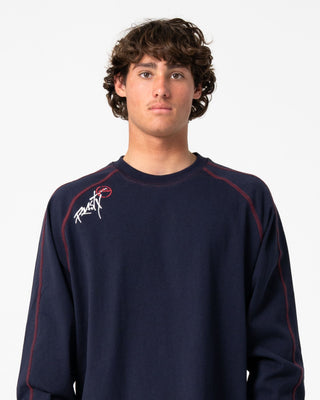 Man wearing Kurupt Long Sleeve Heavy Tee in Navy Blue