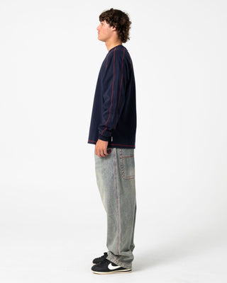 Man wearing Kurupt Long Sleeve Heavy Tee in Navy Blue