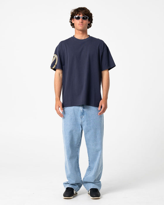 man-wearing-glaze-r-short-sleeve-tee-in-dark-blue