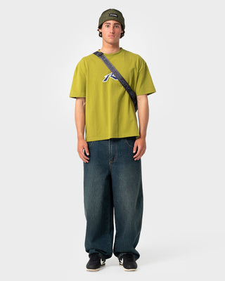 Man wearing Razor Short Sleeve Tee in Sublime Green