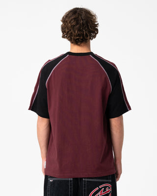 Man wearing Omac Short Sleeve Tee in Burgundy