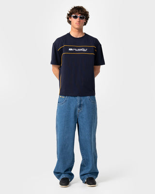 Man wearing Tweaker Short Sleeve Tee in Navy Blue