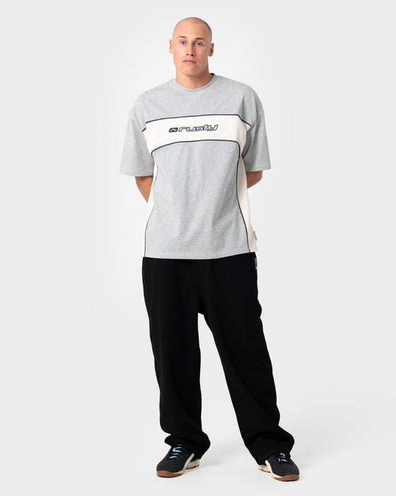 man-wearing-squeeker-short-sleeve-tee-in-grey-marle