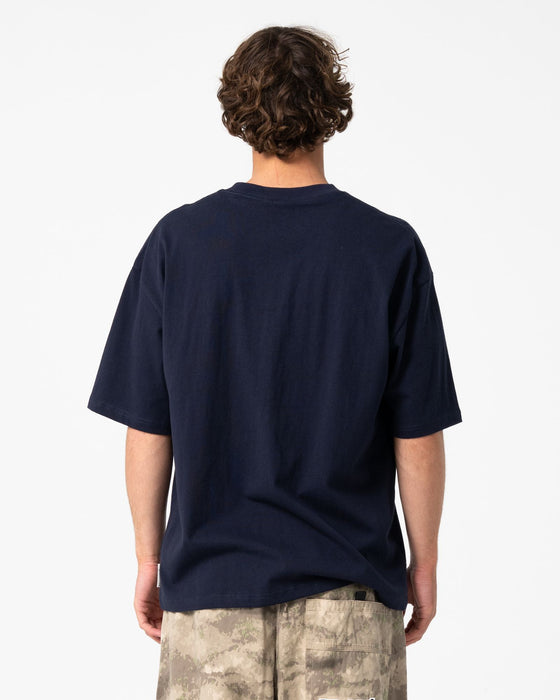 man-wearing-monty-short-sleeve-tee-in-navy-blue