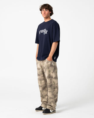 Man wearing Monty Short Sleeve Tee in Navy Blue