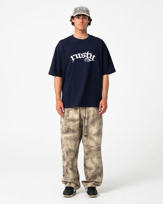 Man wearing Monty Short Sleeve Tee in Navy Blue