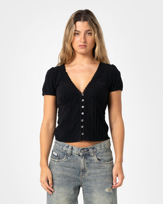 Woman wearing Peggy Sue Button Down Blouse in Black