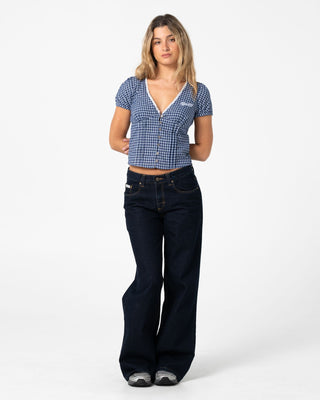woman-wearing-peggy-sue-button-down-blouse-in-blue-plaid