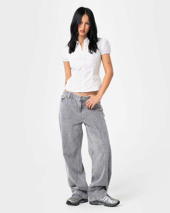 woman-wearing-horizon-zip-through-short-sleeve-shirt-in-mono-stripe