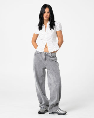 woman-wearing-horizon-zip-through-short-sleeve-shirt-in-mono-stripe