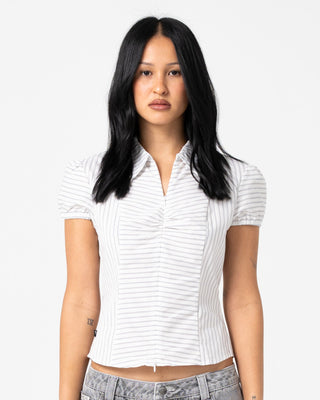 Woman wearing Horizon Zip Through Short Sleeve Shirt in Mono Stripe