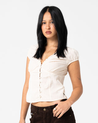 Woman wearing Dakota Short Sleeve Shirt in Cream