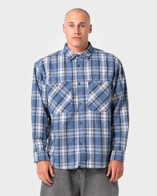 Man wearing Cobra Flannel Long Sleeve Shirt in Royal Blue