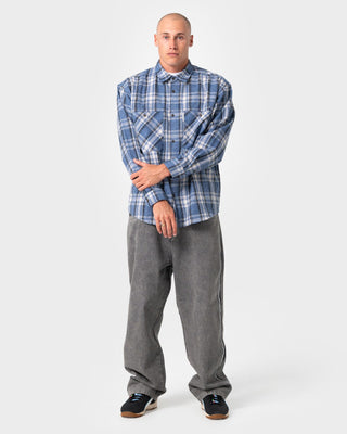 Man wearing Cobra Flannel Long Sleeve Shirt in Royal Blue