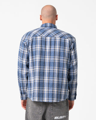 Man wearing Cobra Flannel Long Sleeve Shirt in Royal Blue