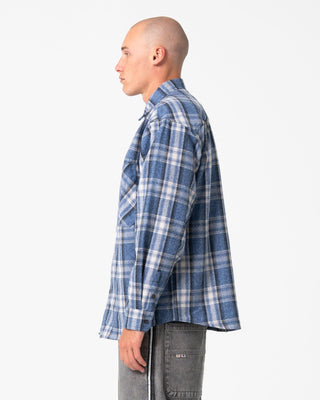 Man wearing Cobra Flannel Long Sleeve Shirt in Royal Blue