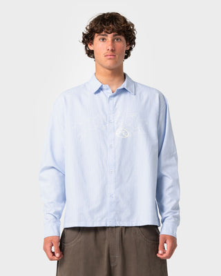 Man wearing Freaker Long Sleeve Shirt in Sky Blue