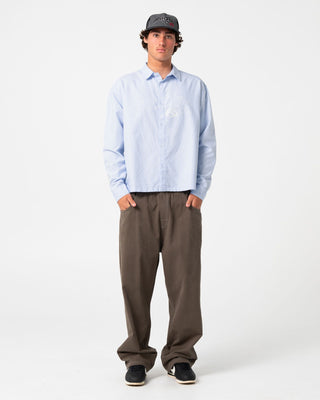 Man wearing Freaker Long Sleeve Shirt in Sky Blue
