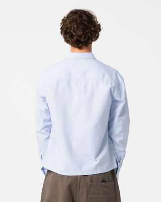 Man wearing Freaker Long Sleeve Shirt in Sky Blue