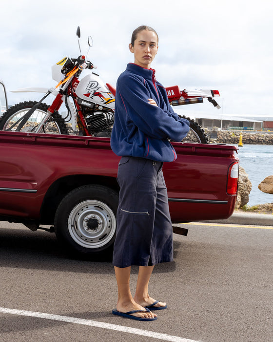 woman-wearing-it-gyrl-low-rise-capri-cargo-pant-in-navy-blue