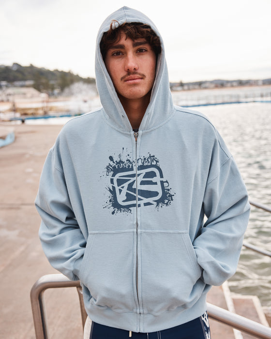 man-wearing-revolt-waffle-zip-thru-hooded-fleece-in-sky-blue