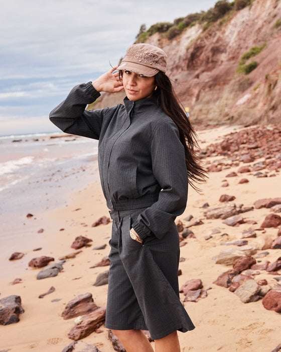 woman-wearing-road-rage-hardstyle-funnel-neck-jacket-in-coal-pinstripe