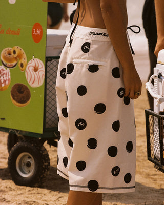 Woman wearing Phelps Fixed Waist Boardshort in Egret
