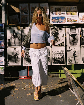 Woman wearing Henry Henley Long Sleeve Top in Sail Blue