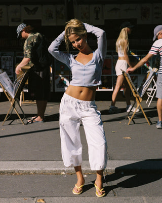 Woman wearing Off Duty Wide Leg Capri Pant in Off White