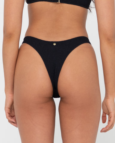 Woman wearing Sandalwood Brazilian Bikini Pant in Black