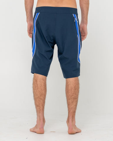 Man wearing Charger Boardshort in Navy Blue / Royal Blue