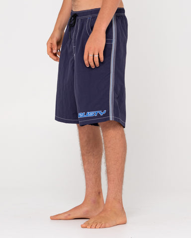 Man wearing Flip Daddy Boardshorts in Navy Blue