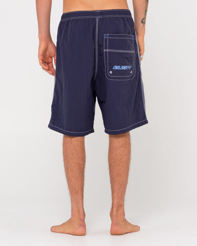 Man wearing Flip Daddy Boardshorts in Navy Blue