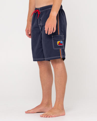 Man wearing Tripped Out Elastic Boardshort in Navy Blue