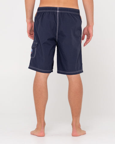 Man wearing Tripped Out Elastic Boardshort in Navy Blue