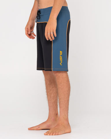 Man wearing Pipe Dreams Boardshort in Black