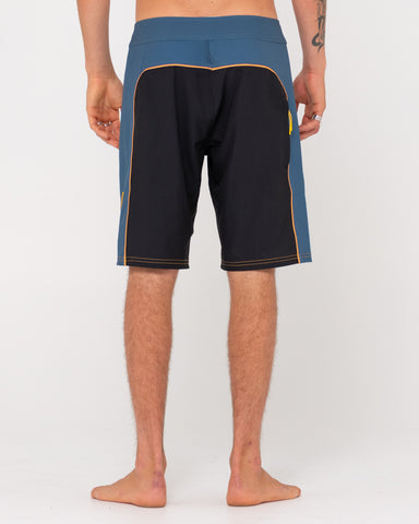 Man wearing Pipe Dreams Boardshort in Black