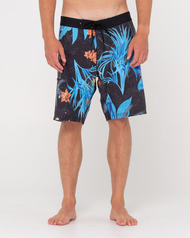 Man wearing Yardidgeridoo Boardshort in Black Floral