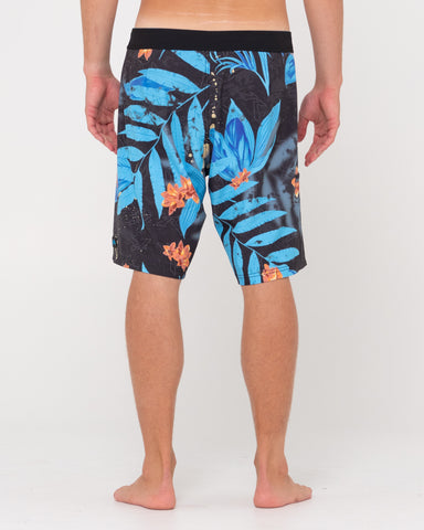 Man wearing Yardidgeridoo Boardshort in Black Floral