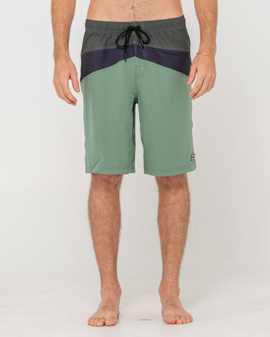 Man wearing Chop Suey Elastic Boardshort in Army Green