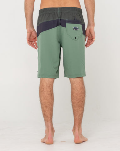 Man wearing Chop Suey Elastic Boardshort in Army Green