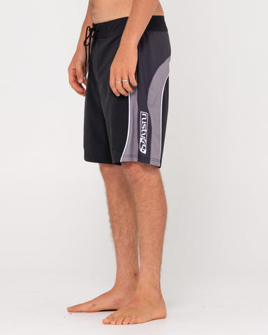 Man wearing Cha-ching Powerweave Boardshort in Black