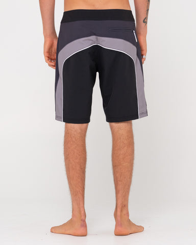 Man wearing Cha-ching Powerweave Boardshort in Black