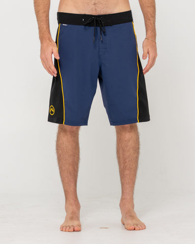 Man wearing Long John Powerweave Boardshort in Navy / Yellow