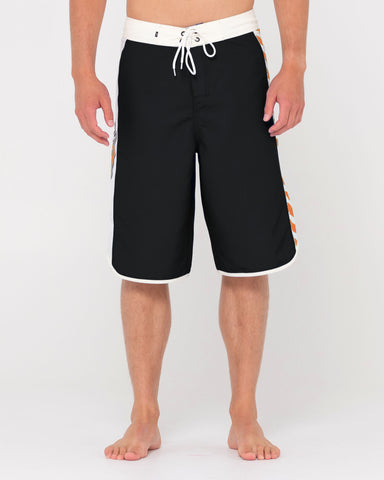 Man wearing Mike N Ike Fixed Boardshort in Black