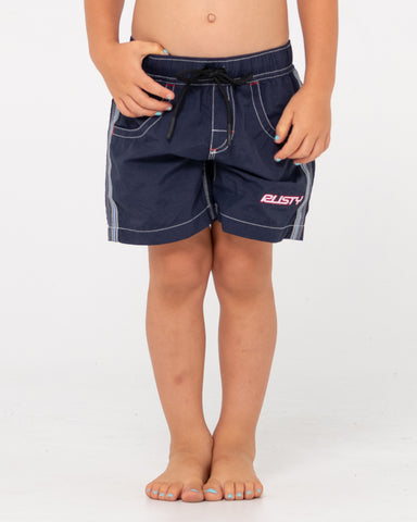 Boy wearing Flip Daddy Boardshort Runts in Navy Blue